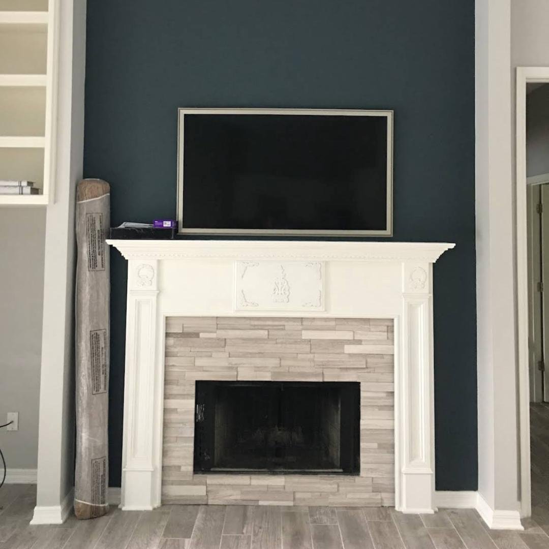 Mounted TV over fireplace by Friendly Local Pros in Sanford FL